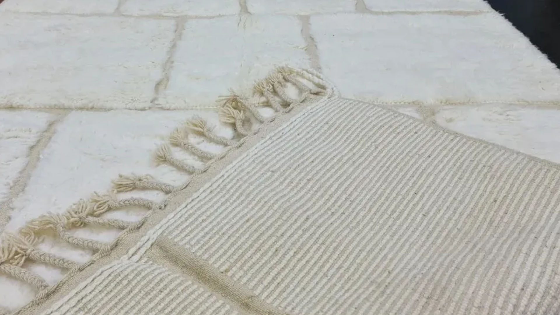 Close-up of hand-knotted Beni Ourain wool and fringes
