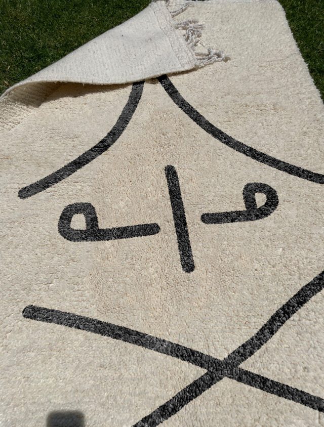 Handwoven Moroccan Rug with Traditional Symbol – photo 5
